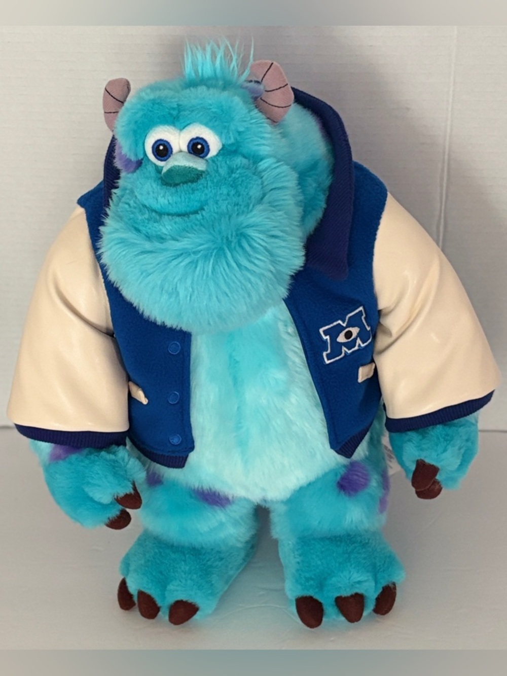 Disney Pixar Monsters University Sulley Stuffed Animal Wearing Varsity Jacket